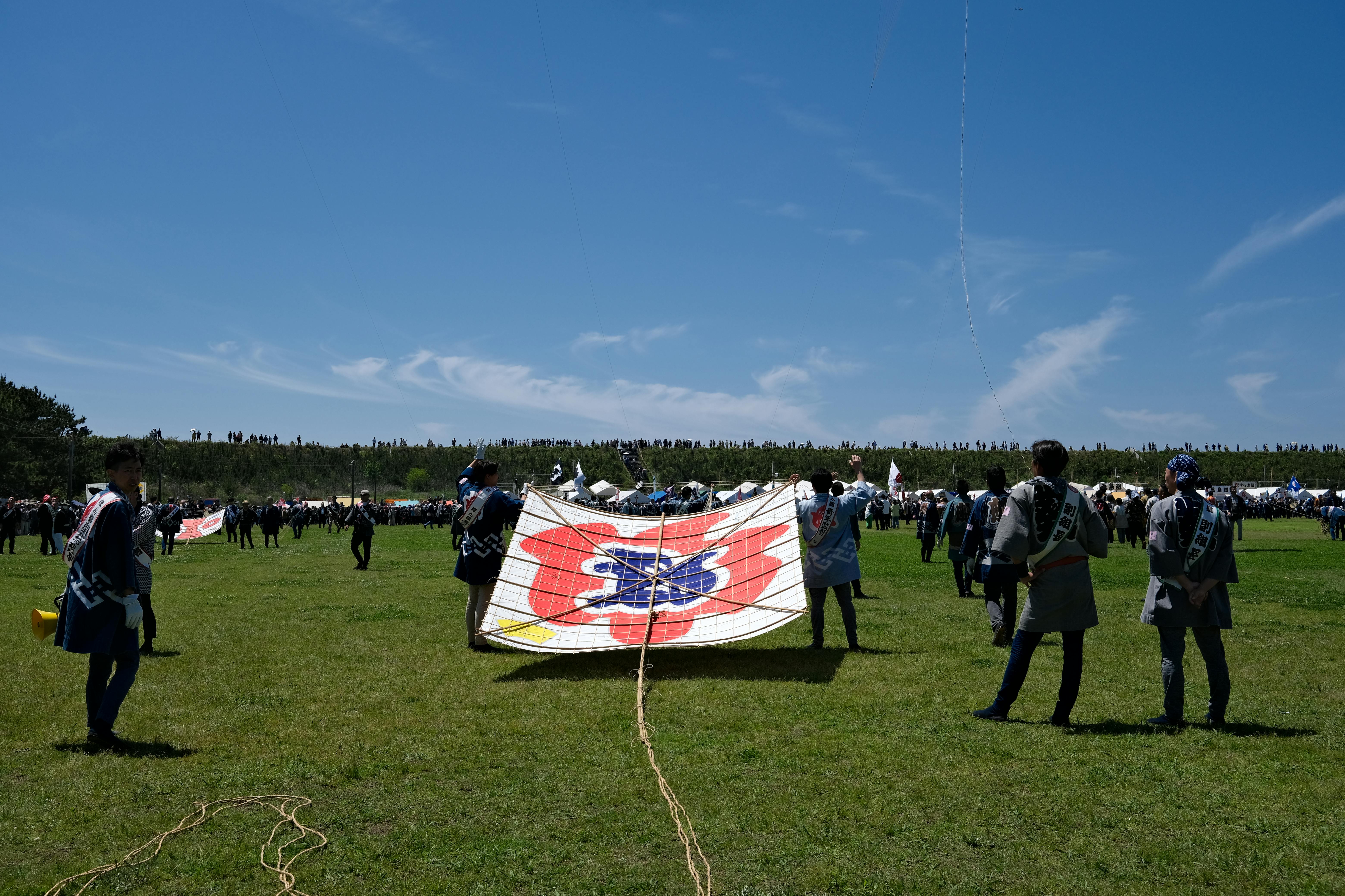 Colorful kites soar at Hamamatsu Festival, capturing Japanese tradition and culture.